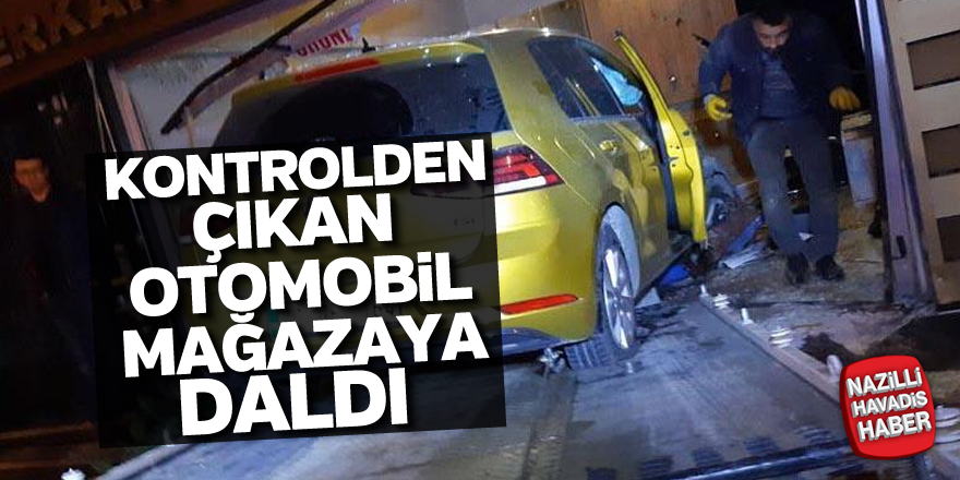 Kontrolden çıkan otomobil mağazaya daldı