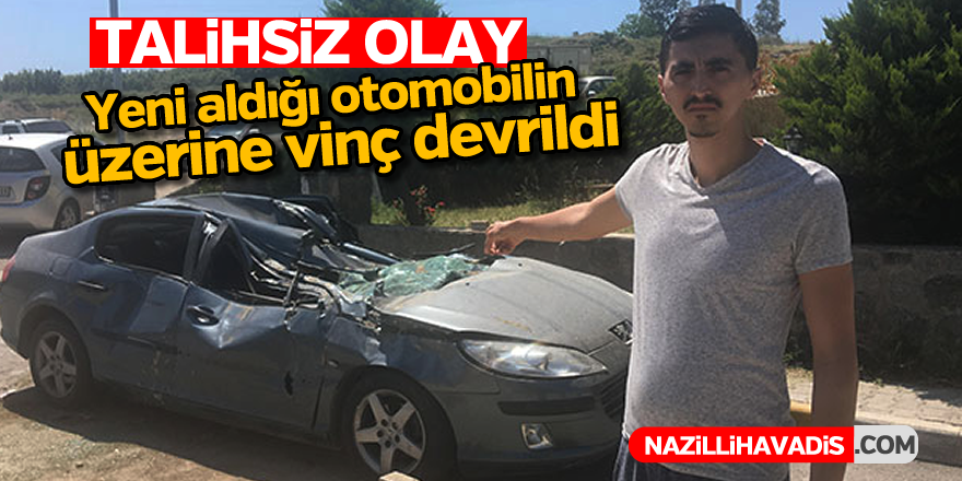 Yeni aldığı otomobilin üzerine vinç devrildi