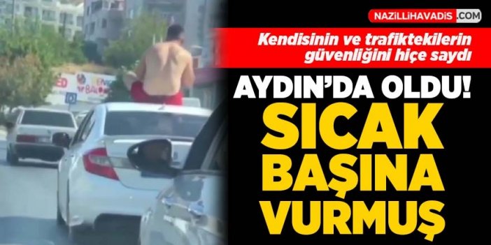 Aydın'da tehlikeli yolculuk! Otomobilin tavanında seyahat etti