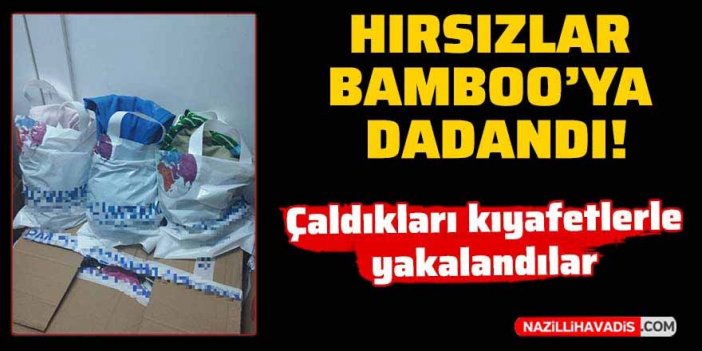 Çaldıkları kıyafetlerle birlikte yakalandılar