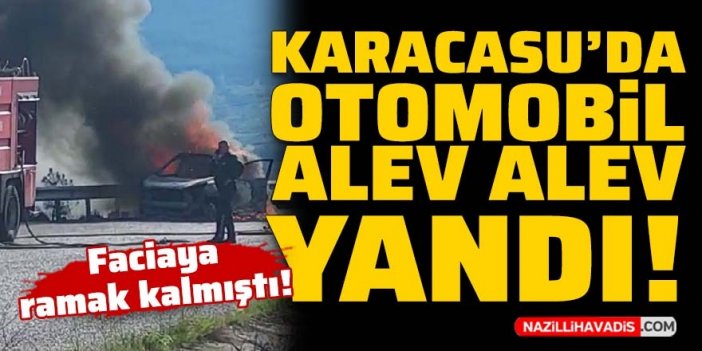 Karacasu’da otomobil cayır cayır yandı, yol trafiğe kapandı