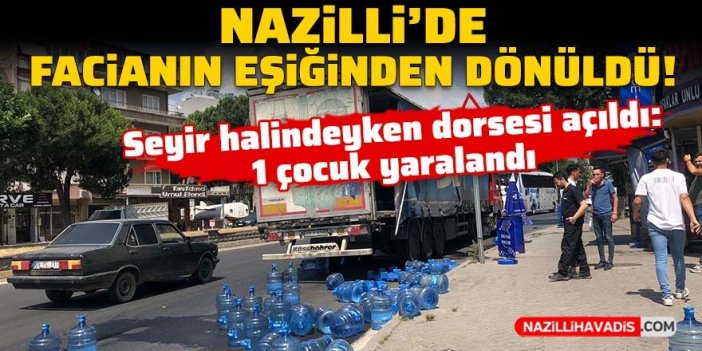 Nazilli’de seyir halindeki tırın dorsesi açıldı, damacanalar yola saçıldı! 1 çocuk yaralı