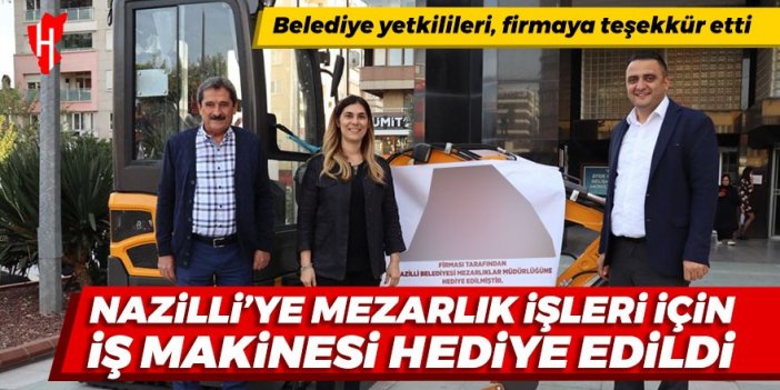 Nazilli'ye mezarlık işleri için iş makinesi hediye edildi