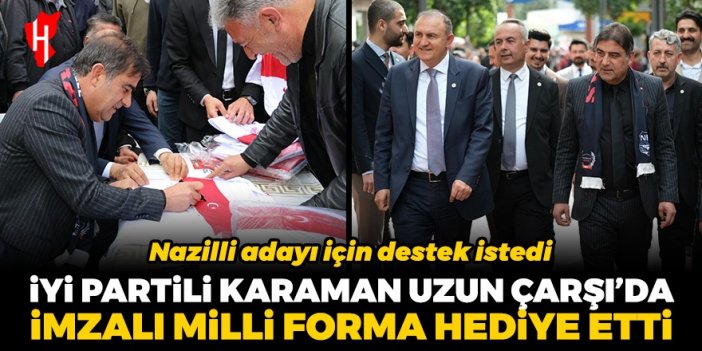 İYİ Partili Karaman, Uzun Çarşı’da imzalı milli forma hediye etti