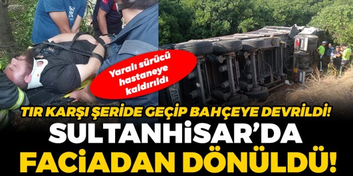 Sultanhisar'da korkutan kaza: Karşı şeride geçen tır, bahçeye devrildi: 1 yaralı!