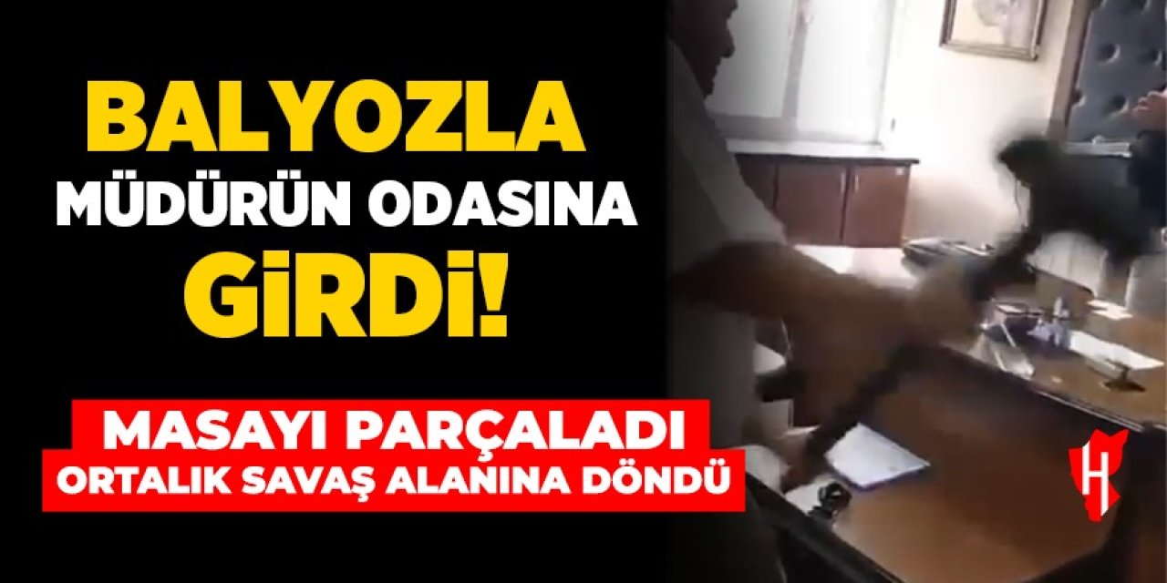 Balyozla müdürün odasına girdi! Masayı parçaladı