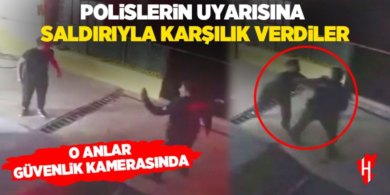 Polislerin uyarısına saldırıyla karşılık verdiler: O anlar güvenlik kamerasına yansıdı