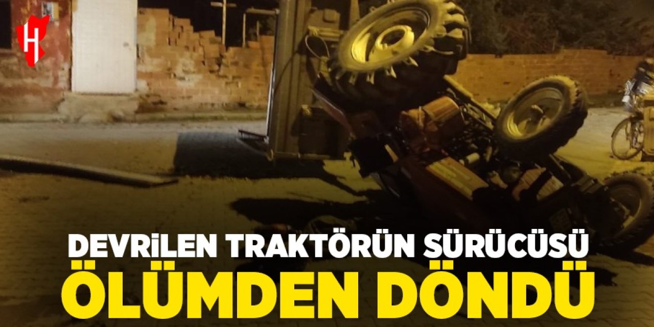 Devrilen traktörün sürücüsü ölümden döndü