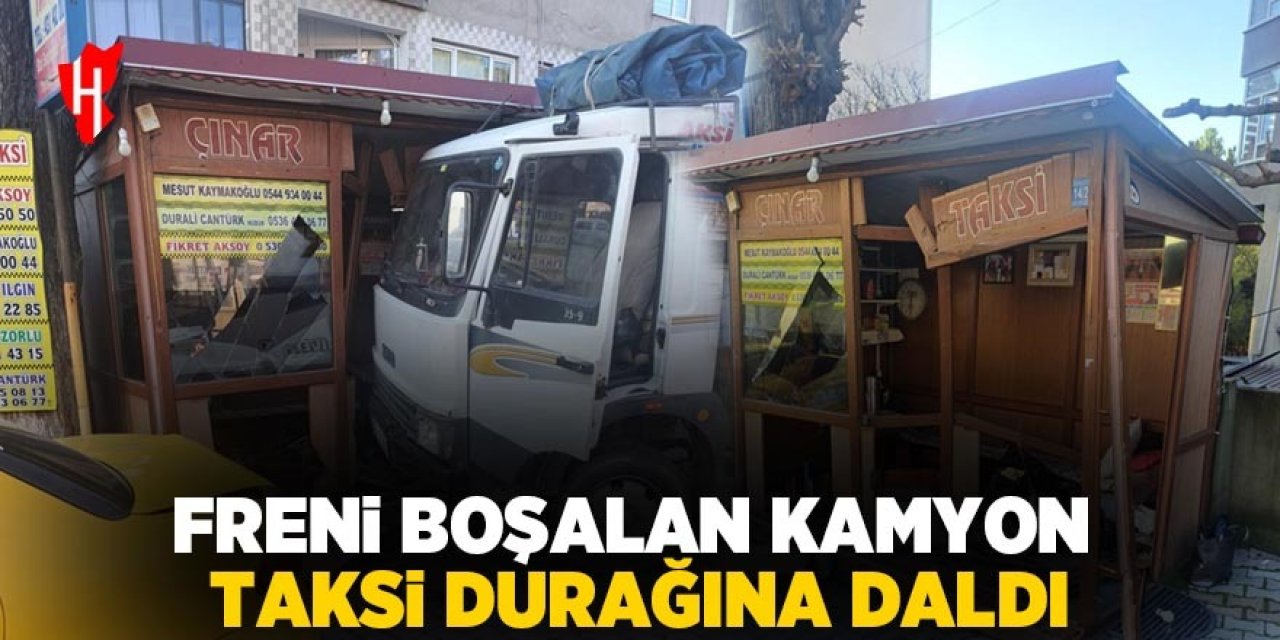 Freni boşalan kamyon taksi durağına daldı