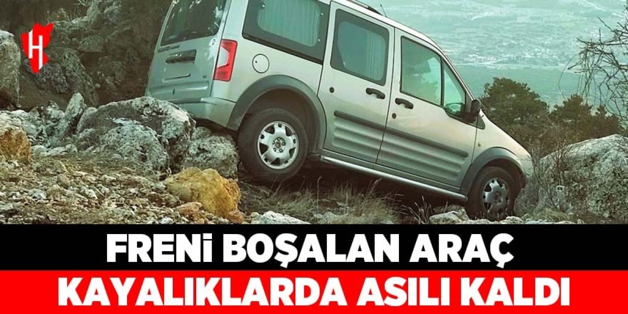 Freni boşalan araç kayalıklarda asılı kaldı