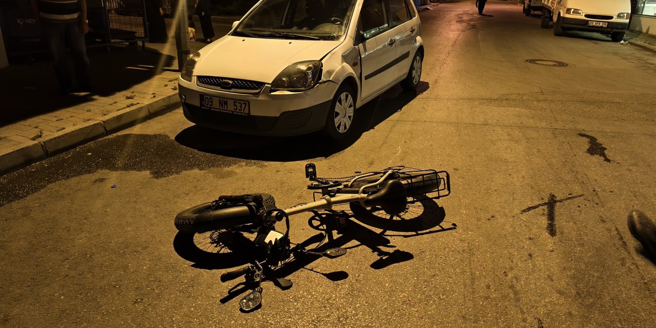 Nazilli’de elektrikli bisiklet ile otomobil çarpıştı: Otomobil sürücüsü olay yerini terk etti