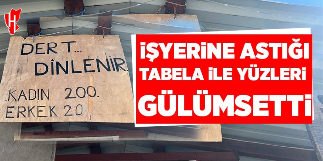 İş yerine astığı tabelayla yüzleri gülümsetti