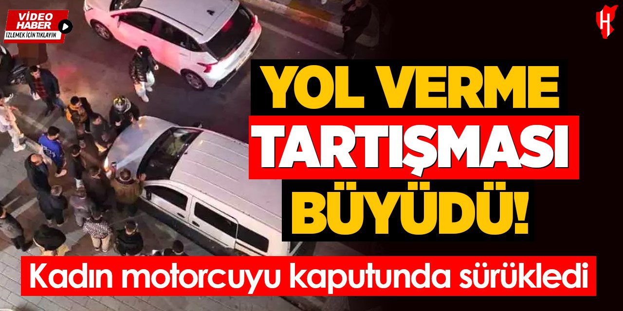 Yol verme tartışması büyüdü: Kadın motorcuyu kaputunda sürükledi