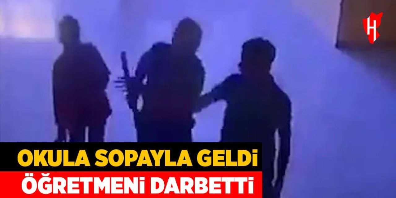 Sopayla okulu basan veli öğretmeni darbetti