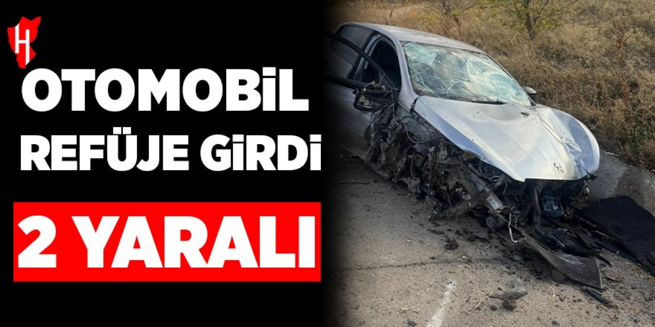 Refüje giren otomobilde 2 kişi yaralandı