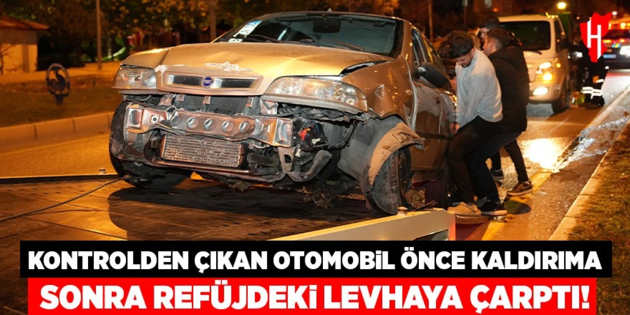 Kontrolden çıkan otomobil önce kaldırıma sonra orta refüjdeki levhasına çarptı