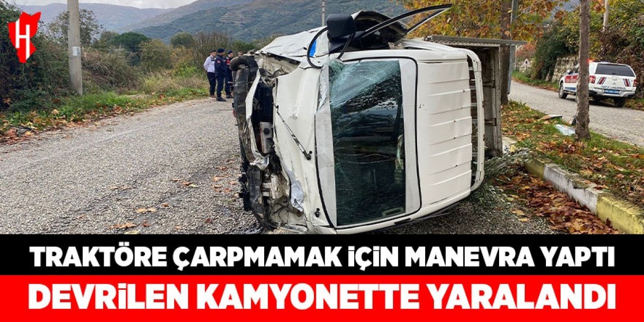 Traktöre çarpmamak için manevra yaptı, devrilen kamyonette yaralandı