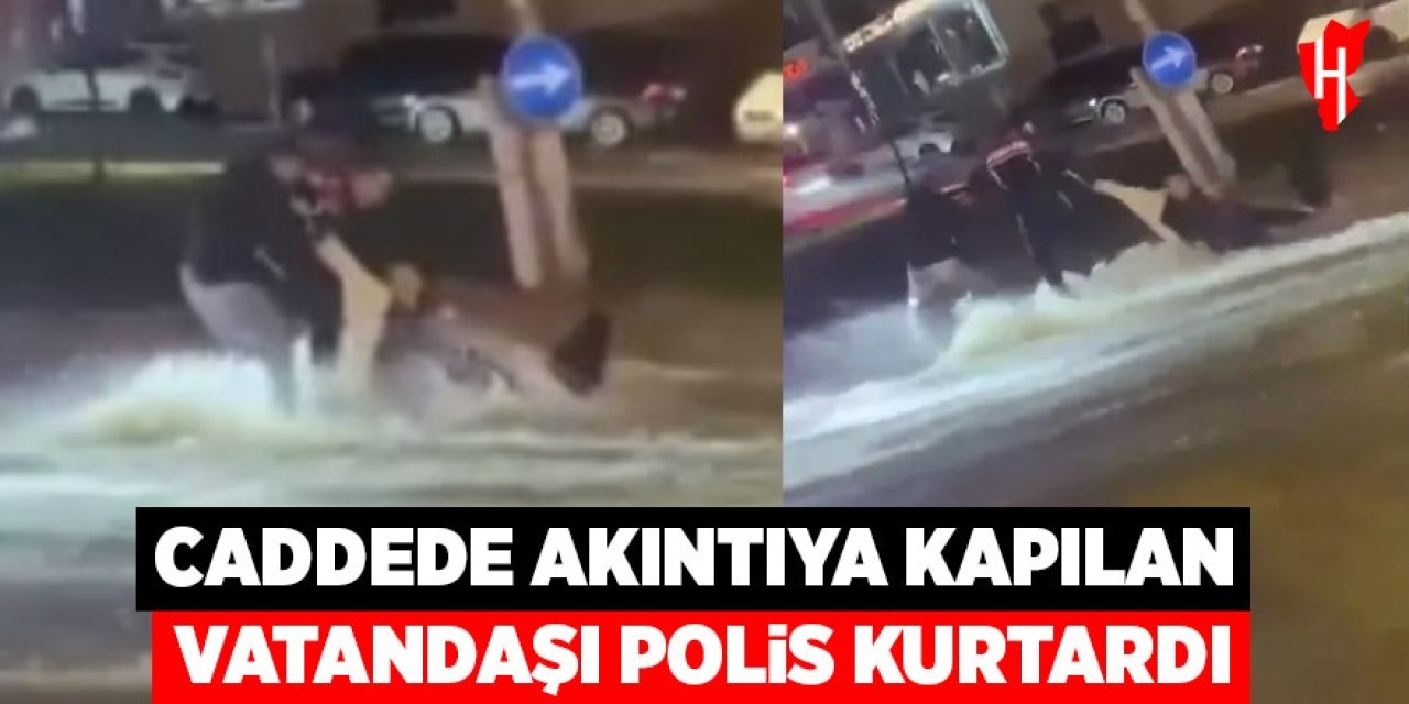 Caddede akıntıya kapılan vatandaşı polis böyle kurtardı
