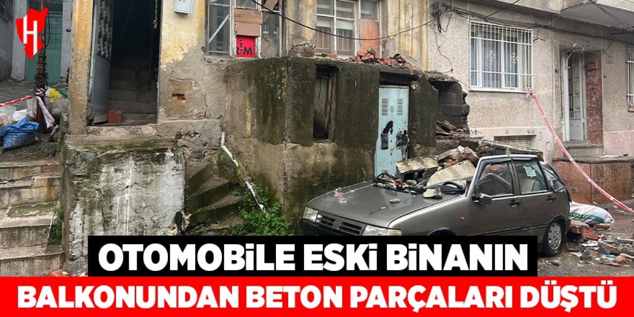 Eski binanın balkonundan düşen beton parçaları bir otomobili kullanılamayacak hale getirdi