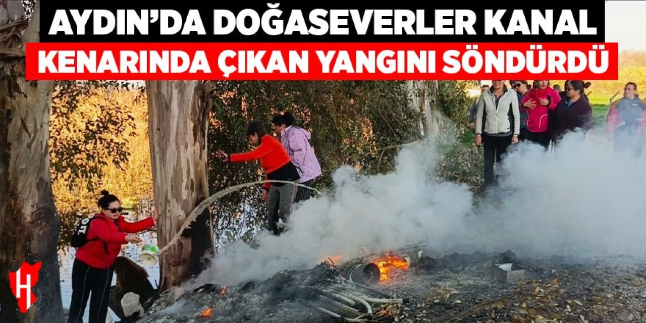 Aydın'da doğaseverler kanal kenarında çıkan yangını söndürdü