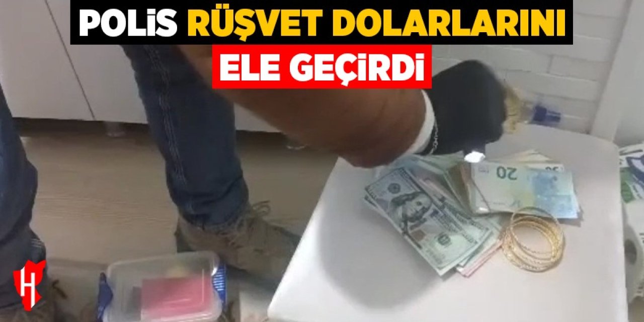 Polis, 'rüşvet dolarları'nı ele geçirdi