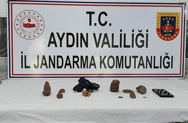 aydinda-6-bin-yillik-muhur-ele-gecirildi-1-gozalti-7622-dhaphoto1.jpg